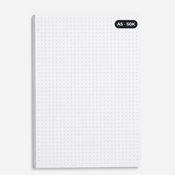 Blok notatnikowy w kropki format A5 50k papier offsetowy 90g na jasnym tle Blok notatnikowy w kropki format A5 50k papier offsetowy 90g na jasnym tle